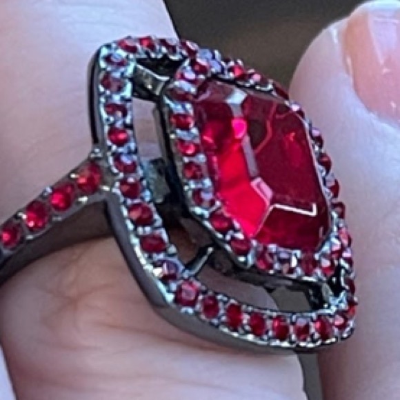 Givenchy Red Crystal
Ring in gunmetal setting. Size 6.75 - Picture 4 of 11
